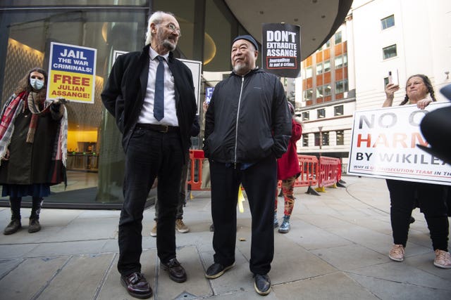 Julian Assange’s father John Shipton with Chinese contemporary artist and activist Ai Weiwei after a silent protest outside the Old Bailey in London in support of Julian Assange