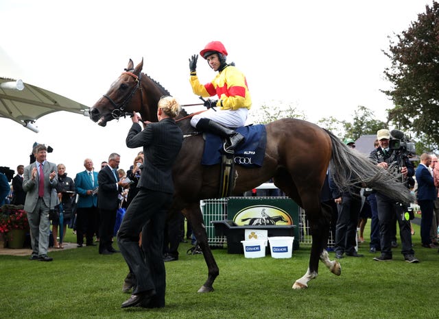 Graham Lee salutes the crowd after winning the Nunthorpe aboard Alpha Delpphini