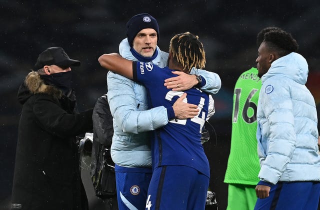 Thomas Tuchel, left, embraces Reece James after the win at Tottenham