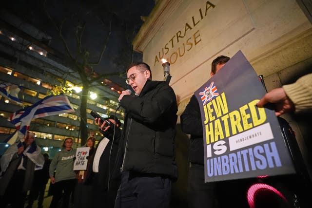 People during a vigil outside the Australian High Commission in central London, following the terrorist attack