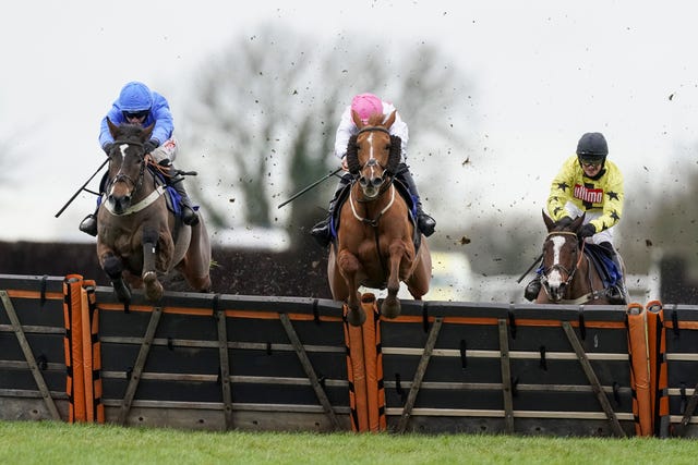 Adam Wedge and Mack The Man (left) clear the last at Wincanton