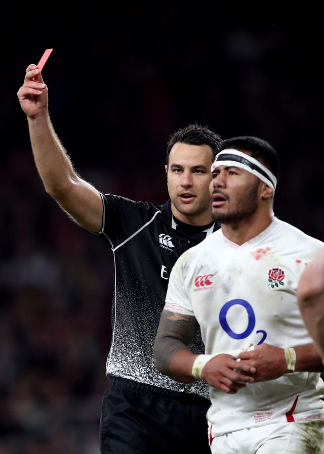 Referee Ben O'Keeffe, left, showed Manu Tuilagi a red card on Saturday for a shoulder-led challenge to the head of George North