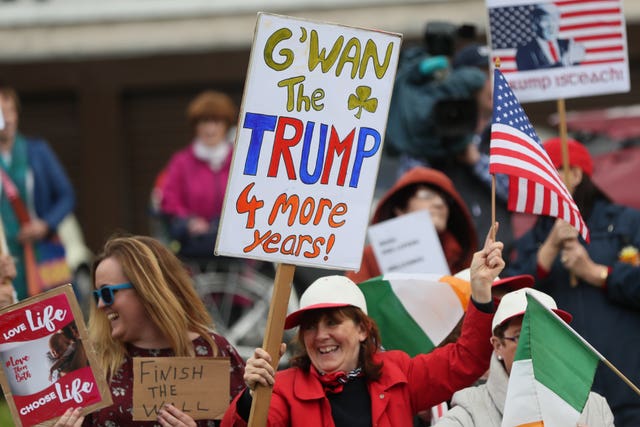 Supporters of US President Donald Trump gather near Shannon Airport