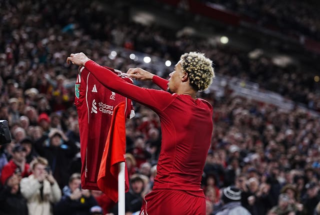 Liverpool’s Hugo Ekitike takes his shirt of to celebrate