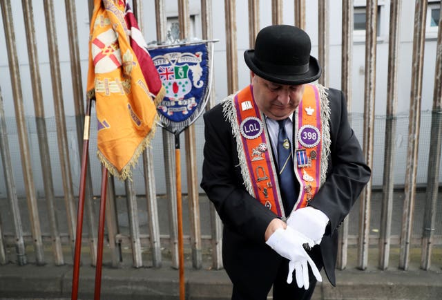 An Orange Order member ahead of a parade in Belfast