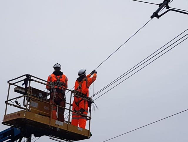 Network Rail engineers working through the night to try and fix damaged electric power cables between Slough and Paddington (Network Rail/PA)