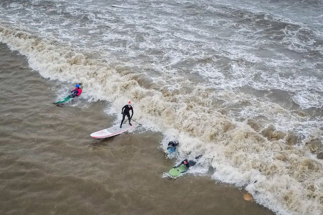 Surfers ride the first five-star Severn Bore of 2019 at Newnham-on-Severn in Gloucestershire (Ben Birchall/PA)