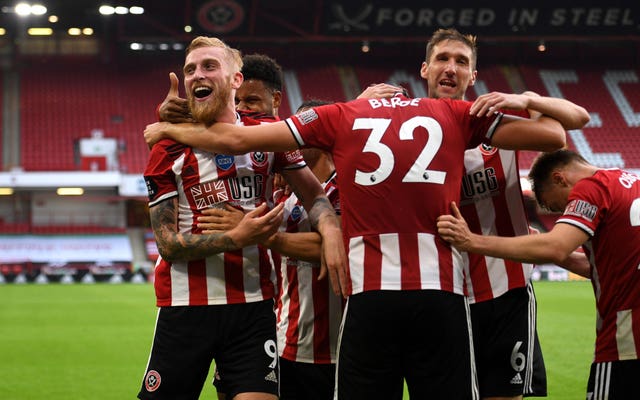 Oli McBurnie celebrates scoring Sheffield United''s third goal 