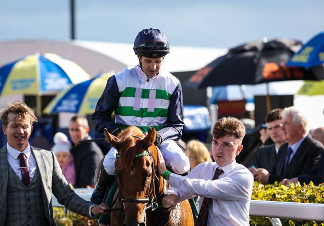 Charlie Bishop after winning the National Stakes with Zavateri