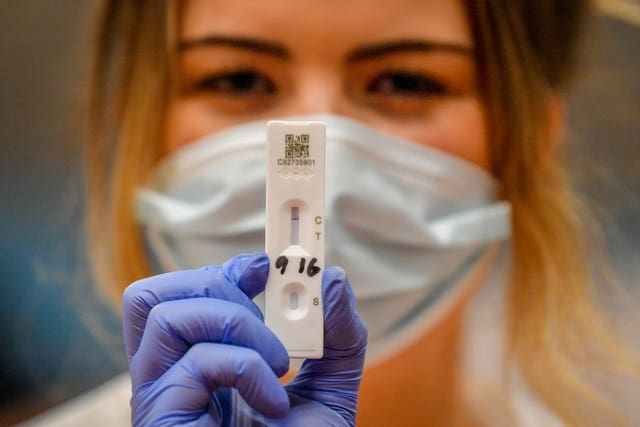 A lateral flow immunoassay diagnostic device, which shows the presence of SARS-CoV-2, which is being used on the public in Merthyr Tydfil