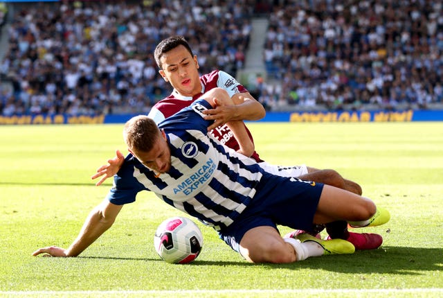 Adam Webster tangled with Dwight McNeil