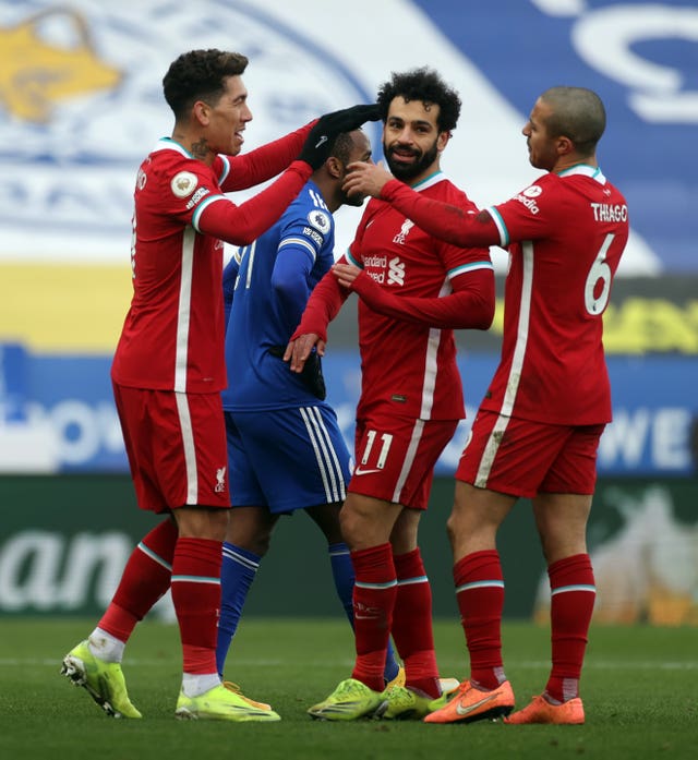 Salah (centre) leads the race for the Premier League Golden Boot this season with 17 goals (Carl Recine/PA).