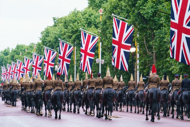 Troops of the Household Cavalry on The Mall, during an early morning rehearsal as service personnel from the Royal Navy, British Army, and Royal Air Force conduct a final early morning rehearsal through London ahead of Sunday’s Platinum Jubilee Pageant, which will mark the finale of the Platinum Jubilee Weekend