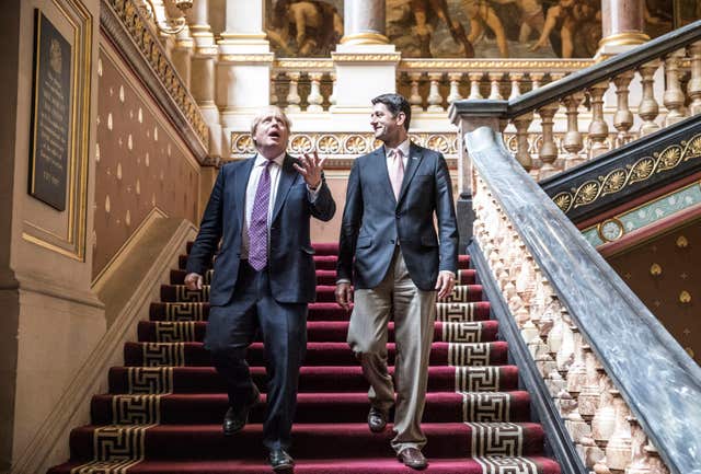 Foreign Secretary Boris Johnson looks up at the ornate ceiling as he walks with US House of Representatives Speaker Paul Ryan, at the Foreign Office in London. (PA Archive)