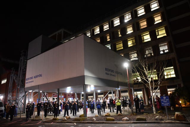 NHS staff outside Bedford Hospital join in with a nationwide clap in honour of Captain Sir Tom Moore