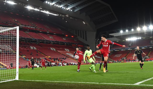 Curtis Jones, right, scores Liverpool's winner