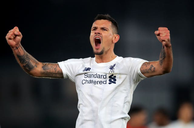 Dejan Lovren has travelled with the Liverpool squad 