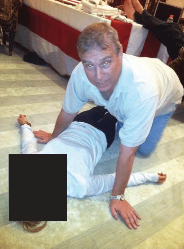 A photograph appearing to show Andrew Mountbatten-Windsor crouched over an unidentified woman