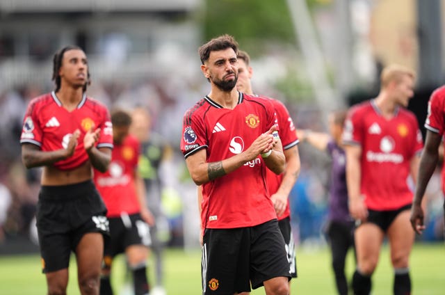 Bruno Fernandes looks sad as he applauds the fans