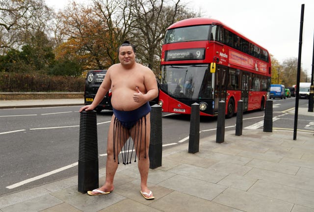 Kitanowaka Daisuke with a bus