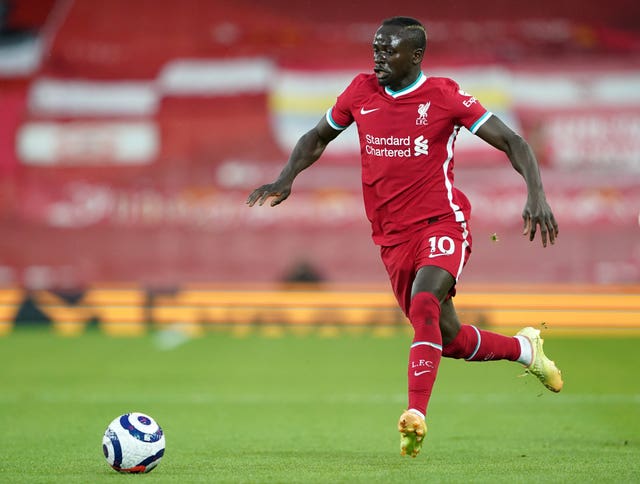 Liverpool’s Sadio Mane runs with the ball