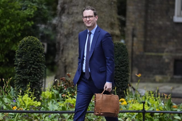 Darren Jones walks up Downing Street