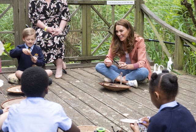 Kate meets children during her visit to the Natural History Museum