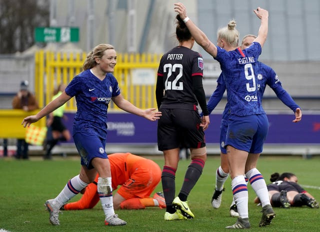 Erin Cuthbert, left, celebrates with fellow goalscorer Bethany England during Chelsea's 3-1 WSL win over Reading