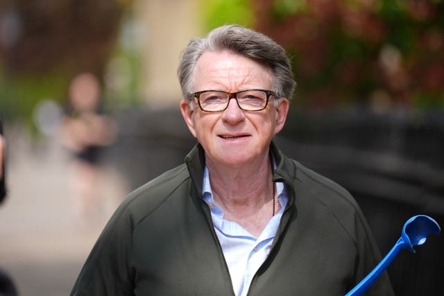 Lord Peter Mandelson out walking his dog