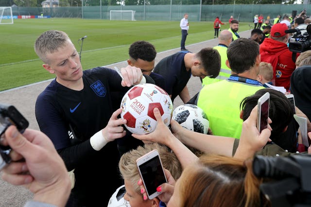 England goalkeeper Jordan Pickford signs autographs for local fans