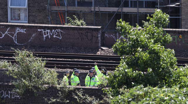 The bodies were found on the railway between Brixton and Denmark Hill (Yui Mok/PA)