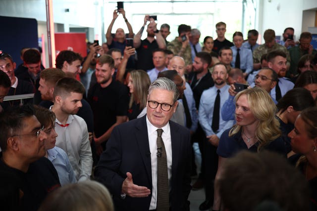 Sir Keir Starmer speaks to employees at a defence contractor's offices