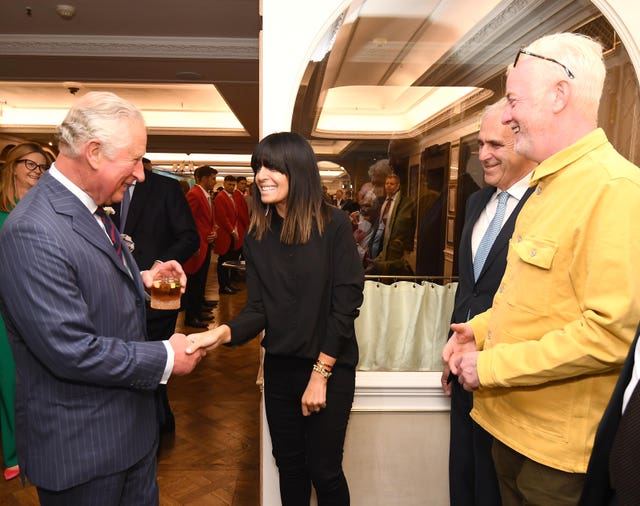 The Prince of Wales shakes hands with Claudia Winkleman