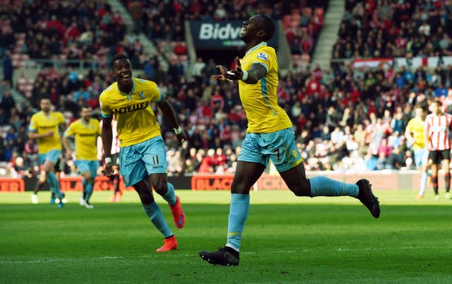 Yannick Bolasie, right, celebrates scoring a hat-trick at Sunderland with Crystal Palace team-mate Wilfried Zaha