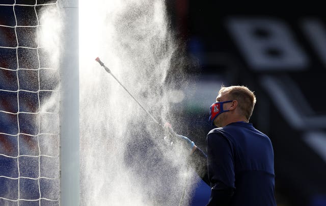 The goalposts are disinfected at half time during Crystal Palace's home victory against Southampton