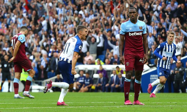 Leandro Trossard (left) celebrates Brighton's equaliser