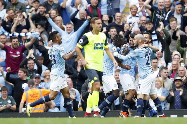 Manchester City swept Huddersfield aside on Sunday