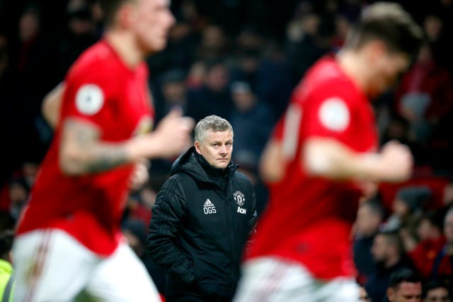 Ole Gunnar Solskjaer, centre, watches on as United were well beaten at home 