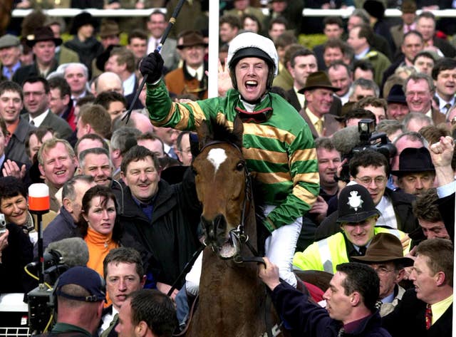 Charlie Swan and Istabraq after winning a third Champion Hurdle at Cheltenham