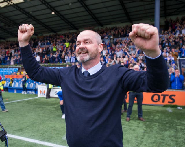 Kilmarnock manager Steve Clarke celebrates after his team secured third place