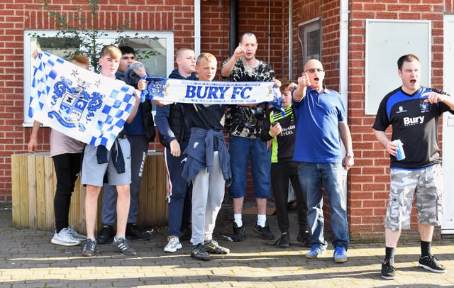 Bury fans gather at Gigg Lane 