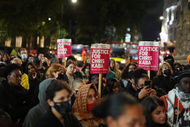People demonstrate outside the Old Bailey in central London on Monday.