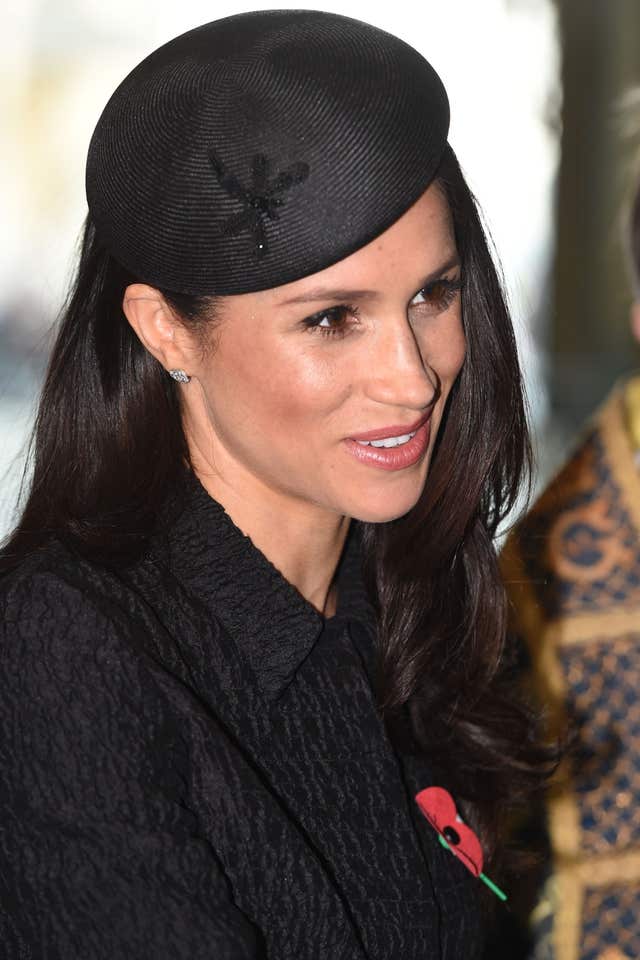 Meghan Markle changed outfits for the services (Eddie Mulholland/Daily Telegraph/PA)