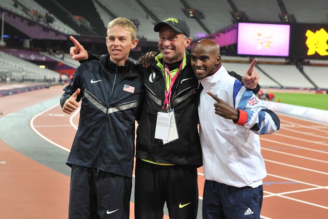 Sir Mo Farah, right, celebrates winning the 10,000m final with Galen Rupp, left, and Alberto Salazar 