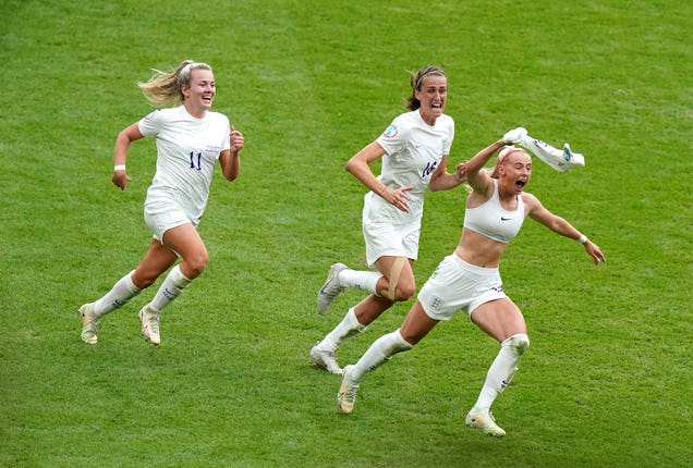 Chloe Kelly (right) celebrates her winning goal