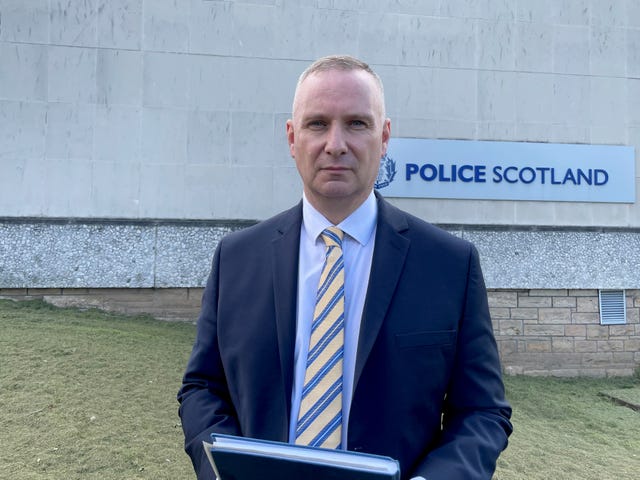 Detective Superintendent Robert Bowie standing outside a Police Scotland base