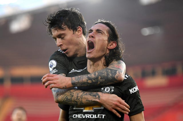 Edinson Cavani, right, celebrates after scoring against Southampton
