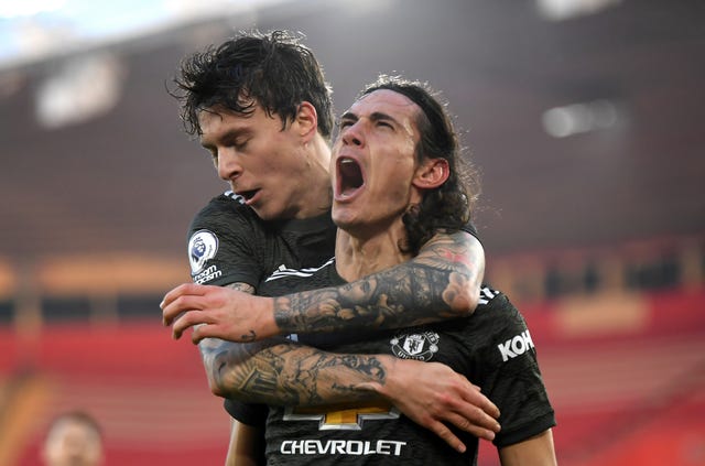 Edinson Cavani, right,  celebrates after scoring against Southampton