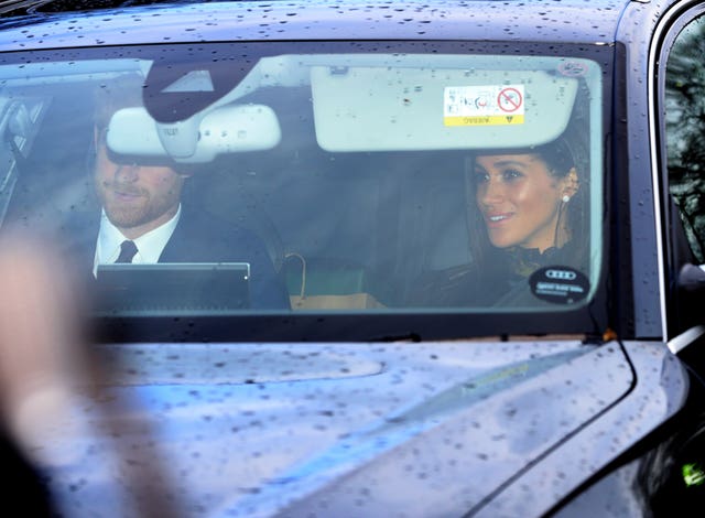 The Duke and Duchess of Sussex arrive for the festive lunch. Aaron Chown/PA Wire