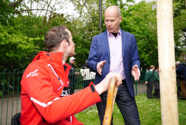 London Marathon events director Hugh Brasher (right) and men’s wheelchair racer Marcel Hug at Paddington Recreation Ground in, London